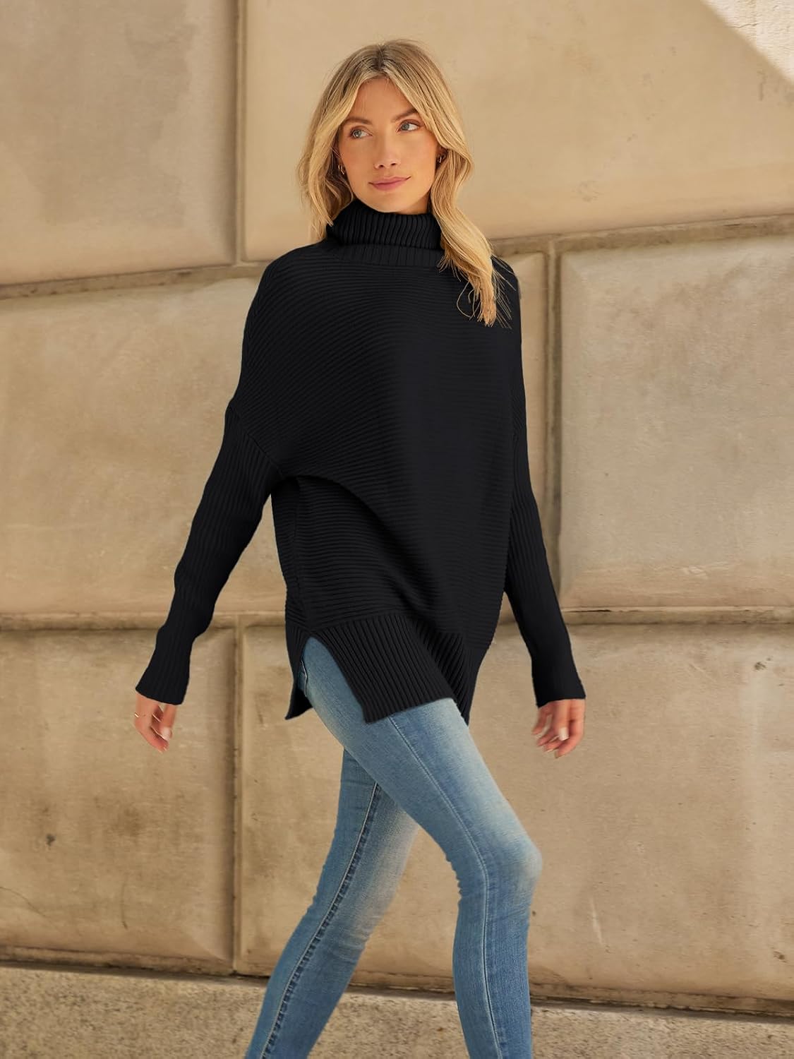 Celine Jersey oversize de cuello alto para mujer – manga larga y bajo asimétrico tipo túnica