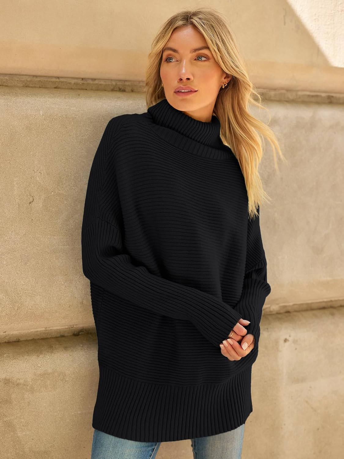 Celine Jersey oversize de cuello alto para mujer – manga larga y bajo asimétrico tipo túnica