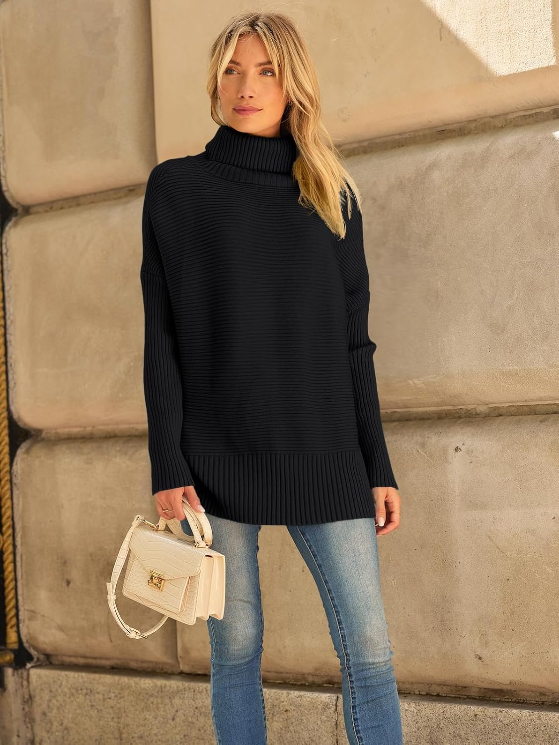 Celine Jersey oversize de cuello alto para mujer – manga larga y bajo asimétrico tipo túnica