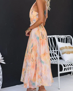 Robe longue fleurie Daphne à dos nu pour femme – légère, fluide et élégante